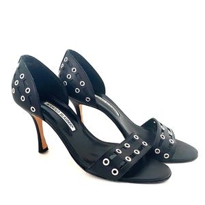 Manolo Blahnik black heels with metal grommets